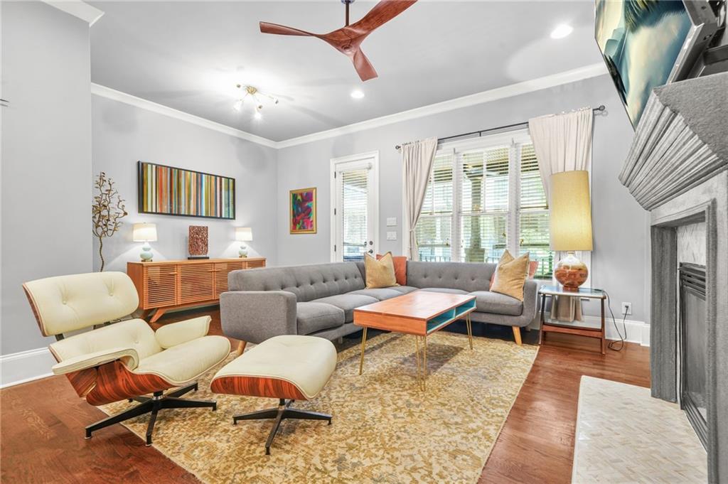 385 15th Street Northwest, Unit 6 Atlanta, GA 30363 - Photo 16 of 49 a living room with furniture and a large window