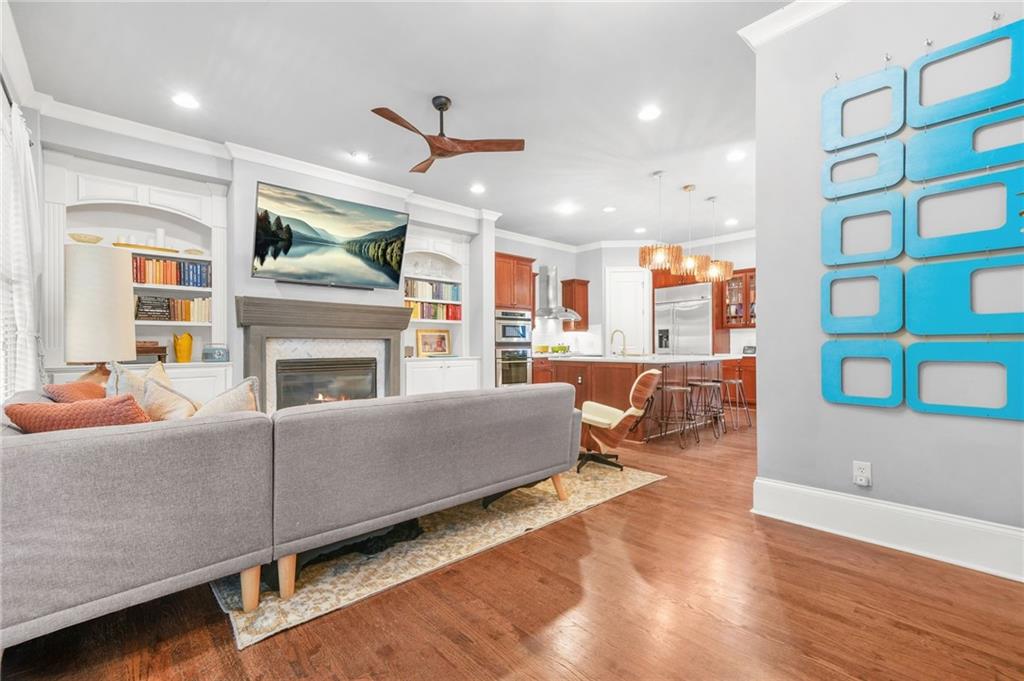 385 15th Street Northwest, Unit 6 Atlanta, GA 30363 - Photo 18 of 49 a living room with furniture and a fireplace