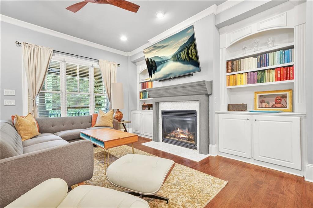 385 15th Street Northwest, Unit 6 Atlanta, GA 30363 - Photo 19 of 49 a living room with furniture fireplace and flat screen tv