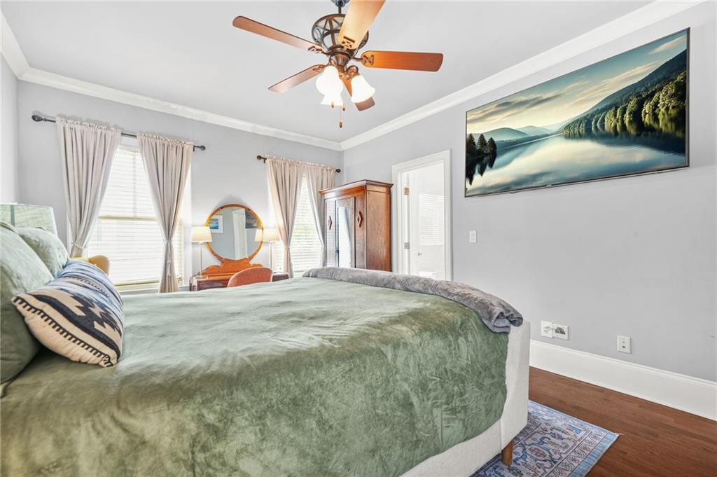 385 15th Street Northwest, Unit 6 Atlanta, GA 30363 - Photo 30 of 49 a bed sitting in a room next to a window