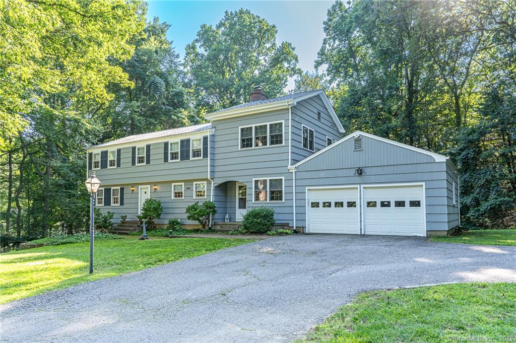 35 Gray Rock Road Trumbull, CT 06611 - Photo 1 of 1 a view of house with outdoor space and large trees
