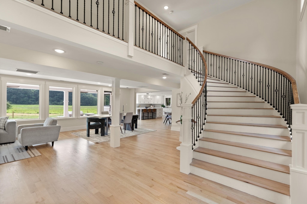 15 Rowley Bridge Road Topsfield, MA 01983 - Photo 3 of 42 a view of entryway and hall with wooden floor