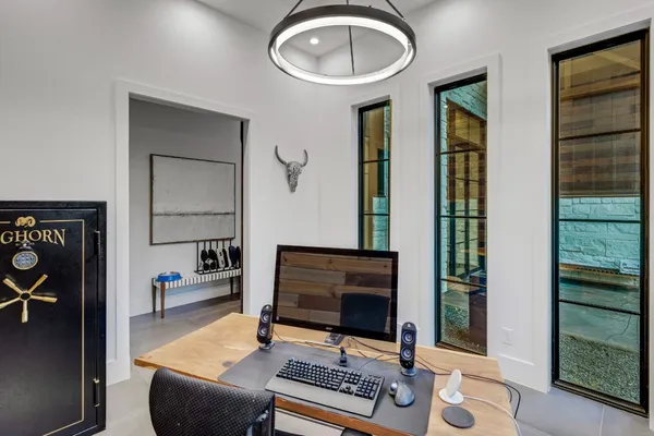 a living room with furniture a rug and a fireplace