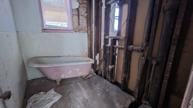 a view of a utility room with a fireplace