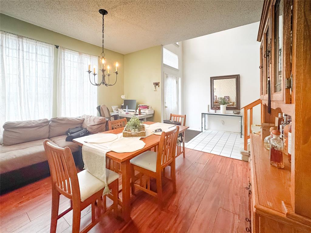 5510 Rolling Green Road Arlington, TX 76017 - Photo 6 of 19 a view of a dining room with furniture window and wooden floor