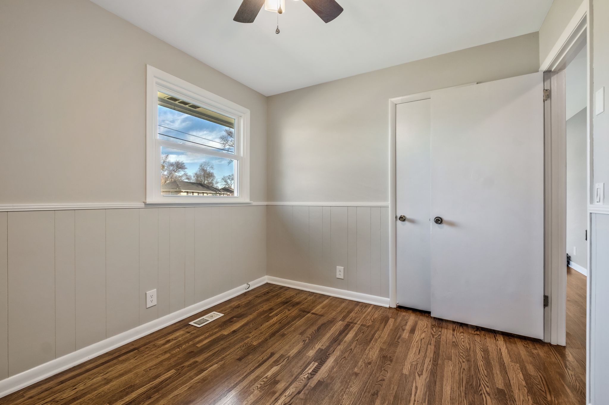 310 Santa Rosa Drive Old Hickory, TN 37138 - Photo 16 of 26 a view of an empty room with wooden floor and a window