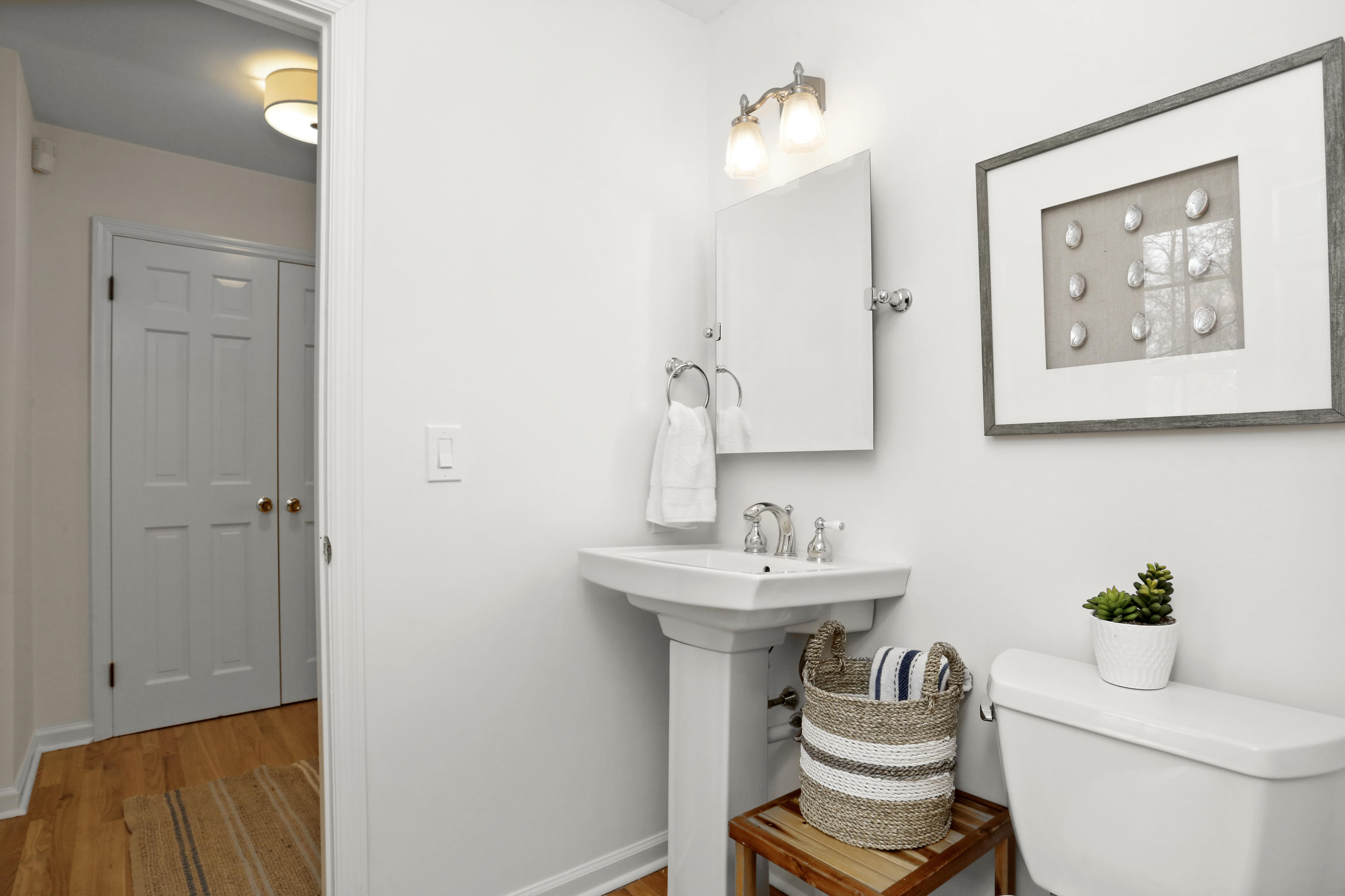 8 Ridge Farms Road Norwalk, CT 06850 - Photo 14 of 31 a bathroom with a sink a toilet and mirror
