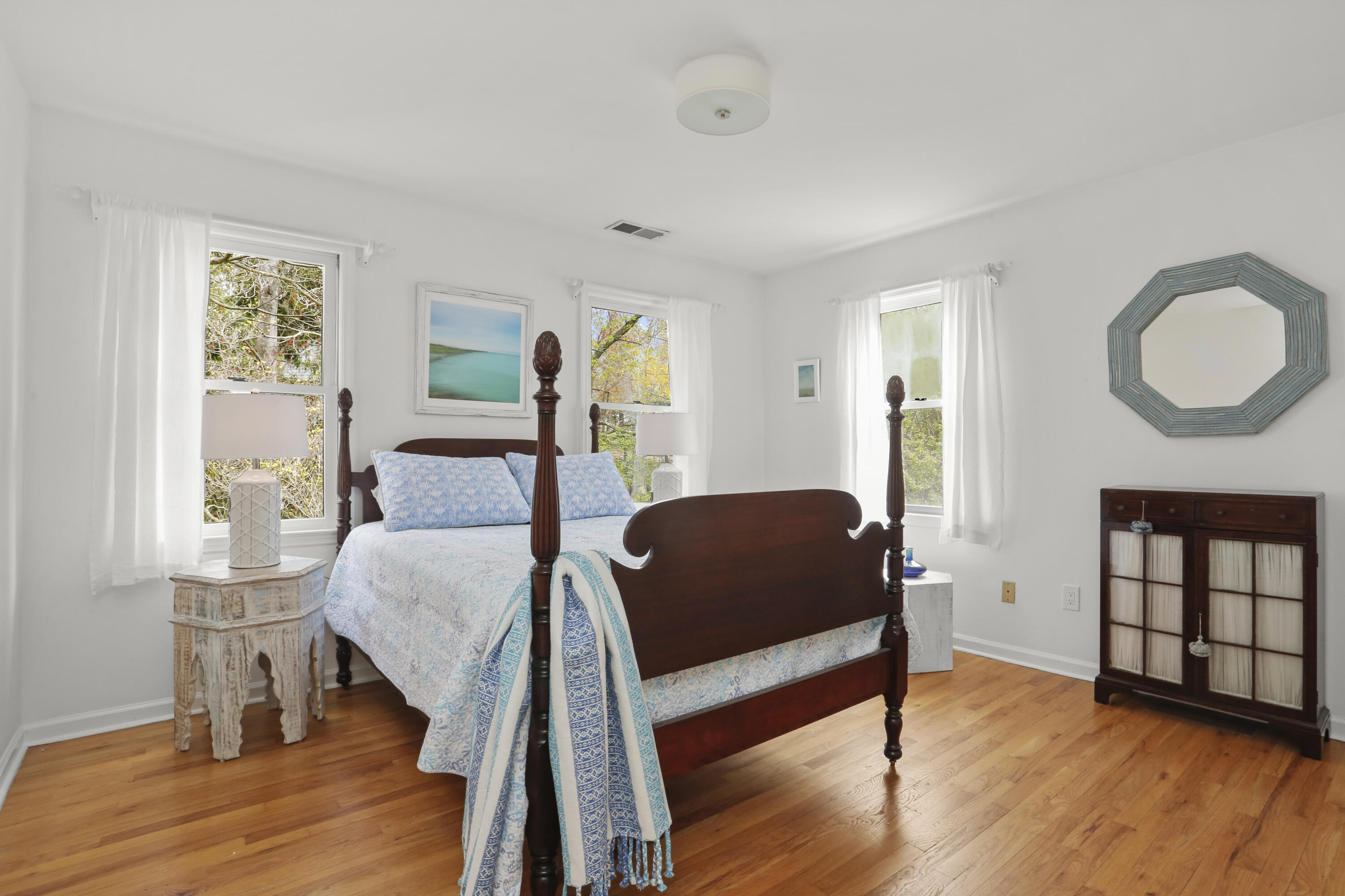 8 Ridge Farms Road Norwalk, CT 06850 - Photo 22 of 31 a bedroom with wooden floor a bed and a window