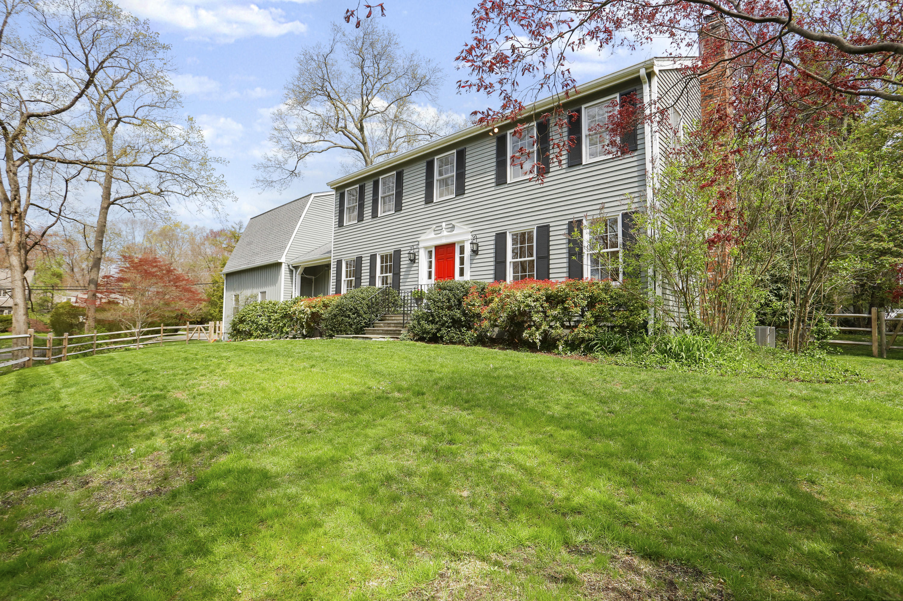 8 Ridge Farms Road Norwalk, CT 06850 - Photo 26 of 31 a front view of house with yard and green space