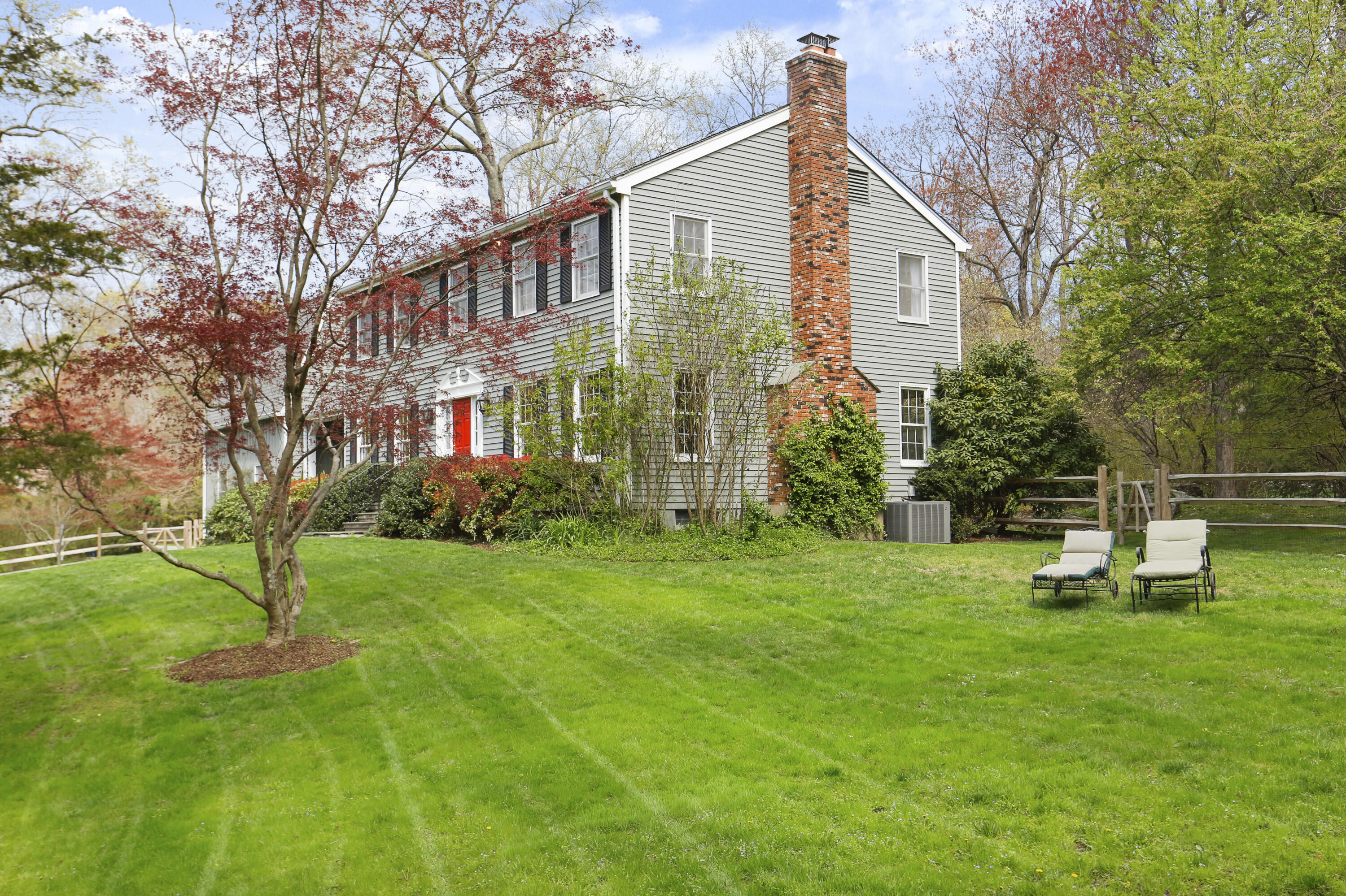 8 Ridge Farms Road Norwalk, CT 06850 - Photo 27 of 31 a front view of a house with garden