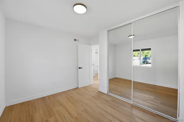 a view of an empty room and window