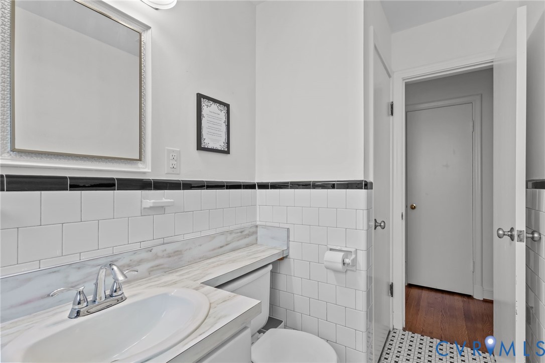 1606 Princeton Road Richmond, VA 23227 - Photo 20 of 52 a bathroom with a sink toilet and shower