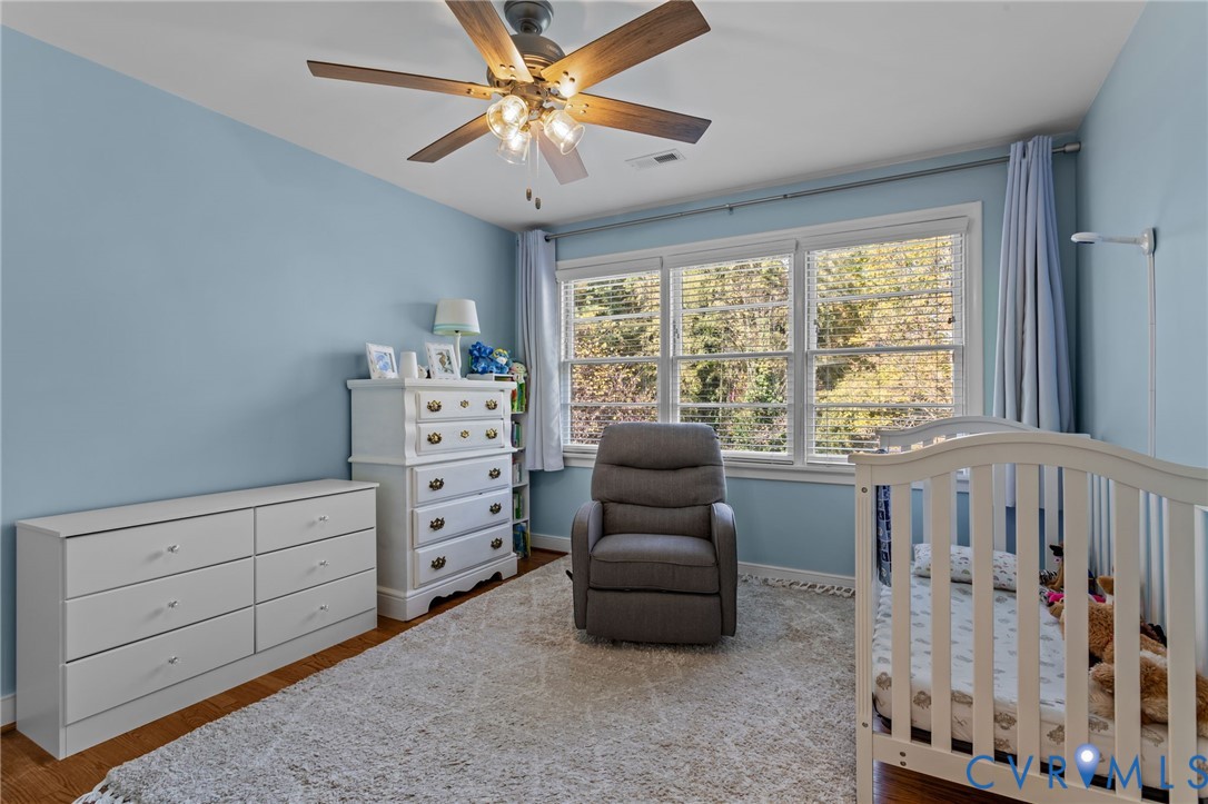 1606 Princeton Road Richmond, VA 23227 - Photo 24 of 52 a bedroom with furniture and a large window