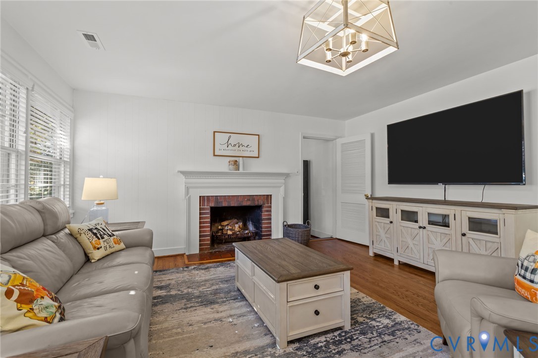 1606 Princeton Road Richmond, VA 23227 - Photo 4 of 52 a living room with furniture and a flat screen tv