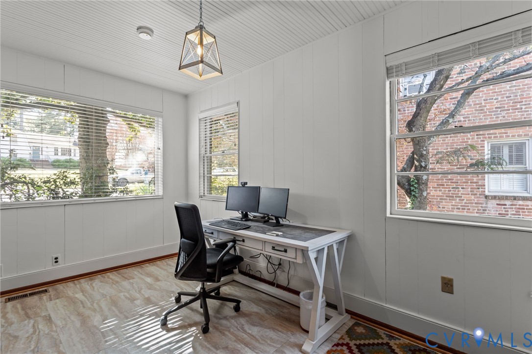 1606 Princeton Road Richmond, VA 23227 - Photo 8 of 52 a workspace with wooden floor and windows