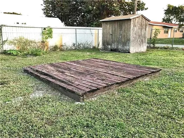 a car parked in front of a house