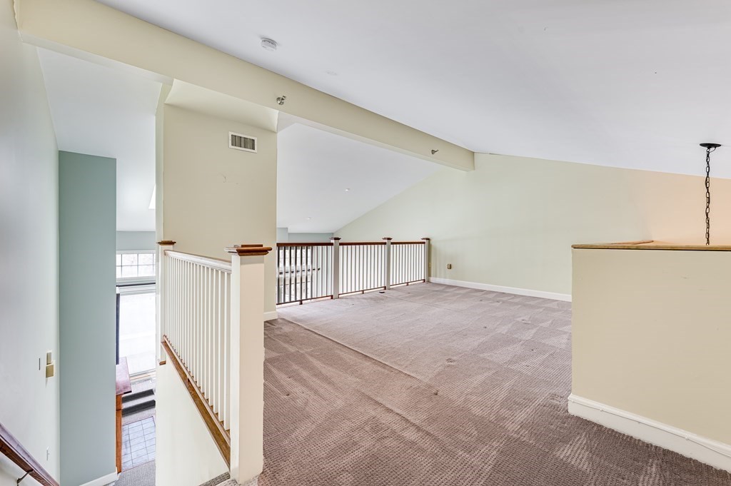 116 Milton Street, Unit 231 Dedham, MA 02026 - Photo 14 of 27 a view of hallway with stairs