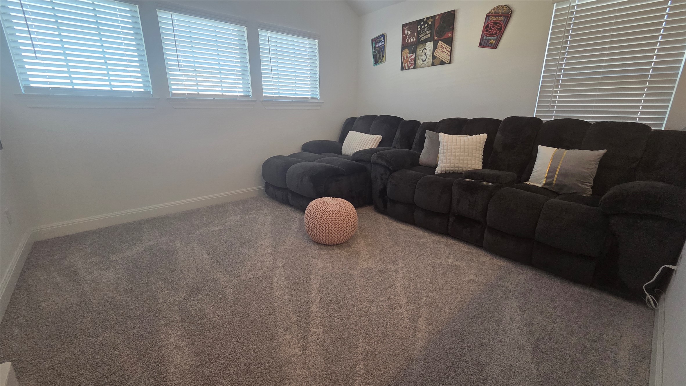 125 Raleigh Drive Georgetown, TX 78633 - Photo 14 of 30 Living area featuring carpet flooring and baseboards