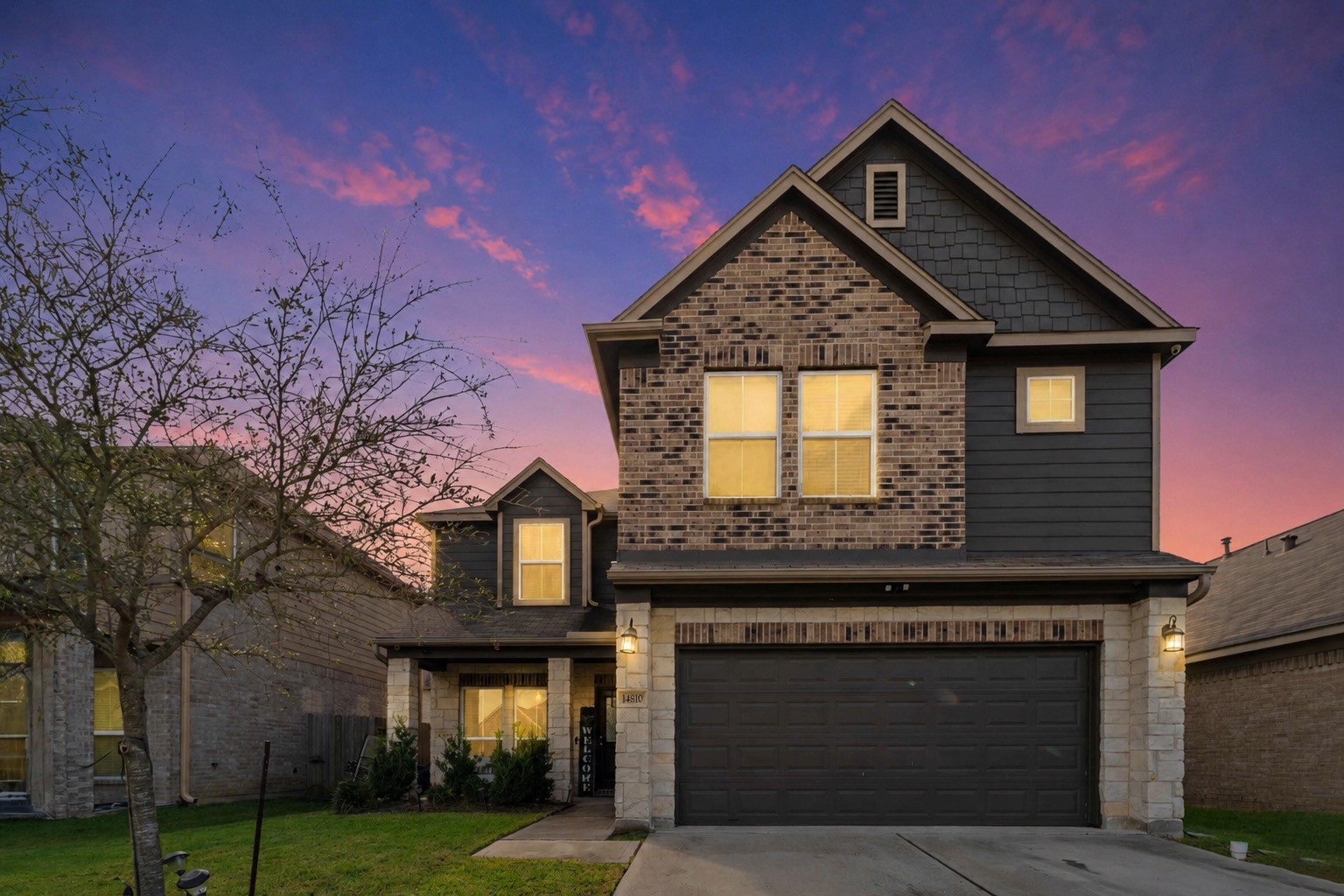 14810 Ruddy Duck Lane Houston, TX 77049 - Photo 2 of 33 a front view of a house with garden