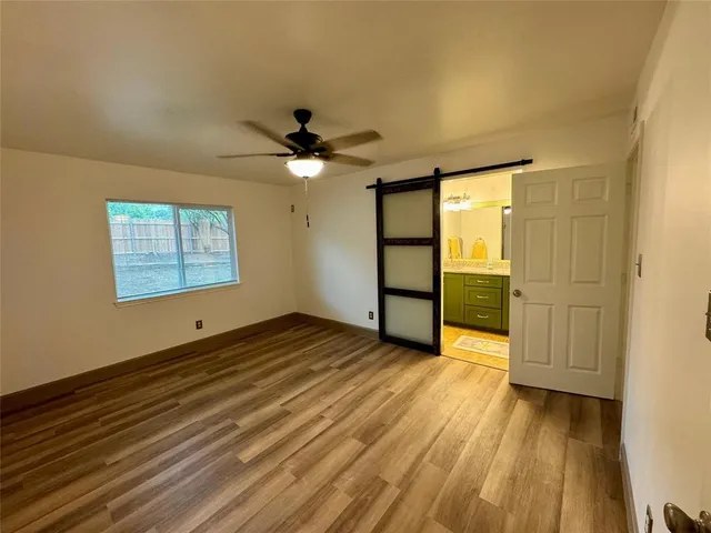 a bathroom with a sink double vanity and a mirror