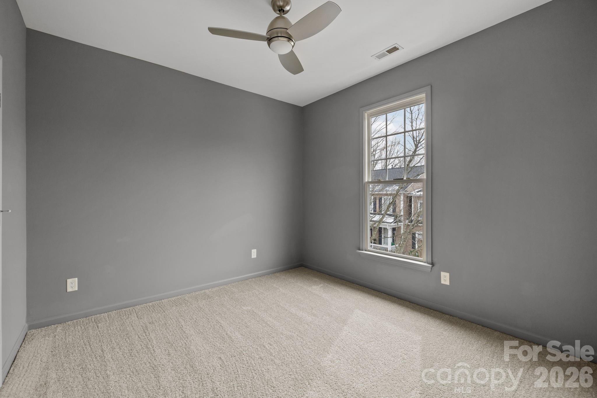 173 Blandina Court, Unit 426 Fort Mill, SC 29708 - Photo 15 of 32 a view of an empty room with a window