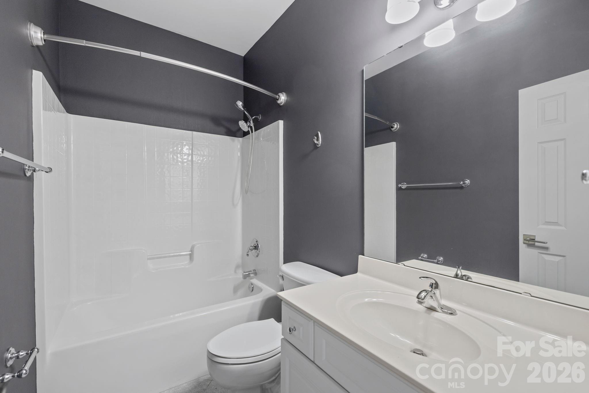 173 Blandina Court, Unit 426 Fort Mill, SC 29708 - Photo 17 of 32 a bathroom with a sink toilet and shower
