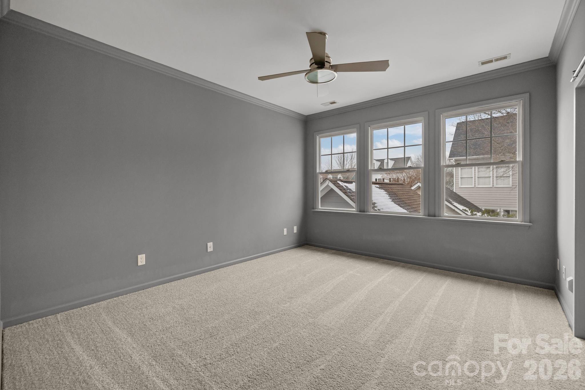 173 Blandina Court, Unit 426 Fort Mill, SC 29708 - Photo 20 of 32 a view of an empty room with a window