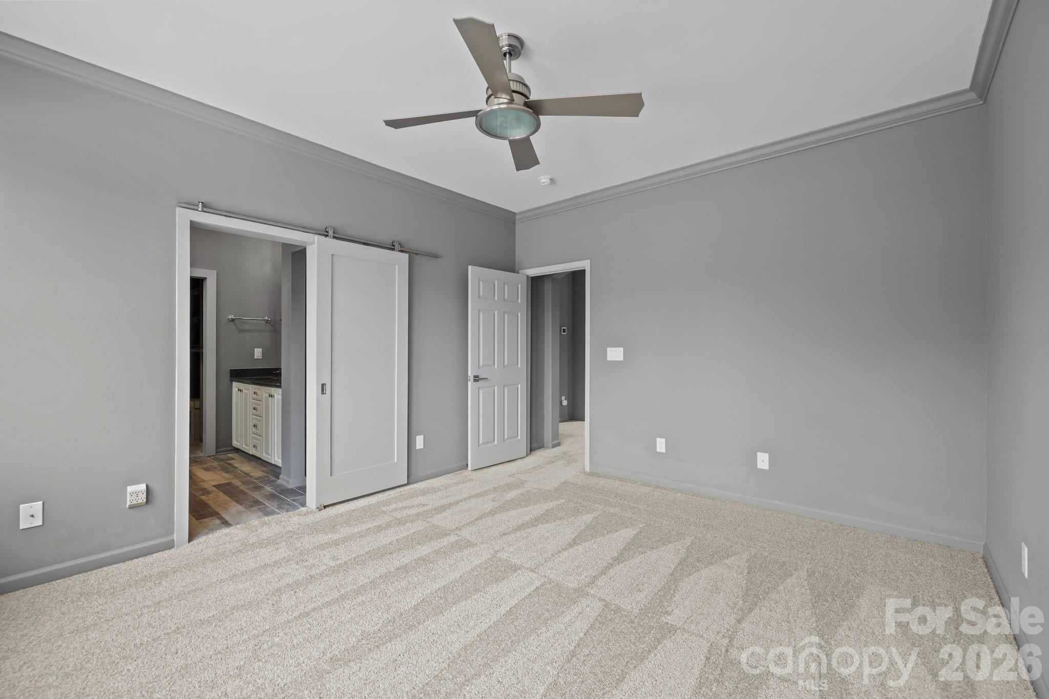 173 Blandina Court, Unit 426 Fort Mill, SC 29708 - Photo 21 of 32 a view of a room with a ceiling fan and hardwood floor