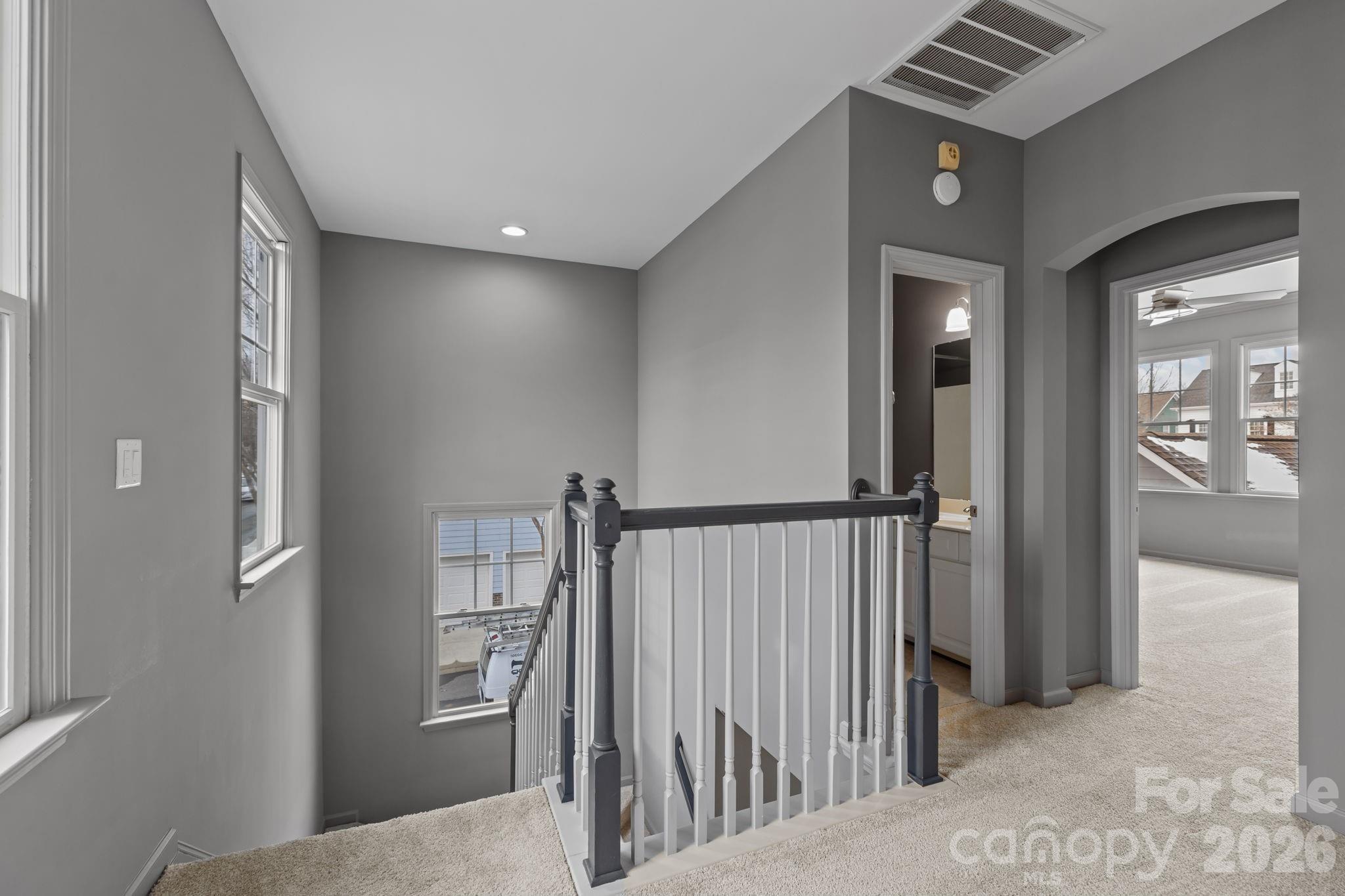173 Blandina Court, Unit 426 Fort Mill, SC 29708 - Photo 26 of 32 a view of staircase with white walls