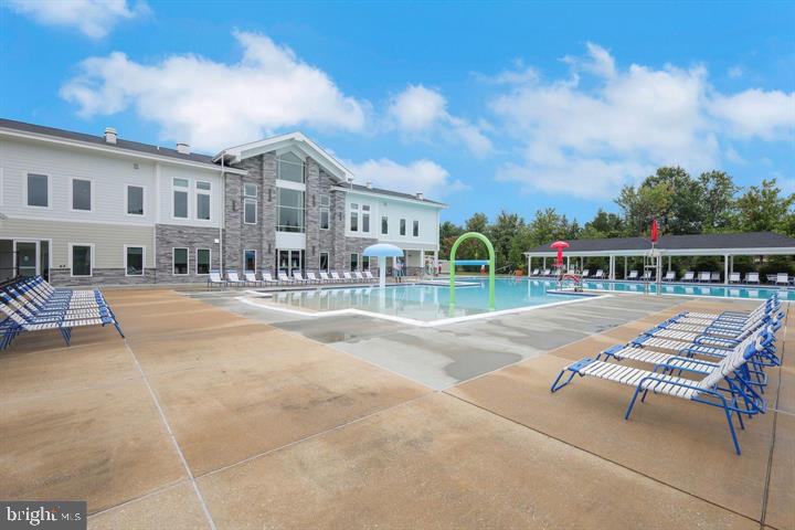 9817 Solar Course Laurel, MD 20723 - Photo 39 of 59 a swimming pool view with a outdoor seating