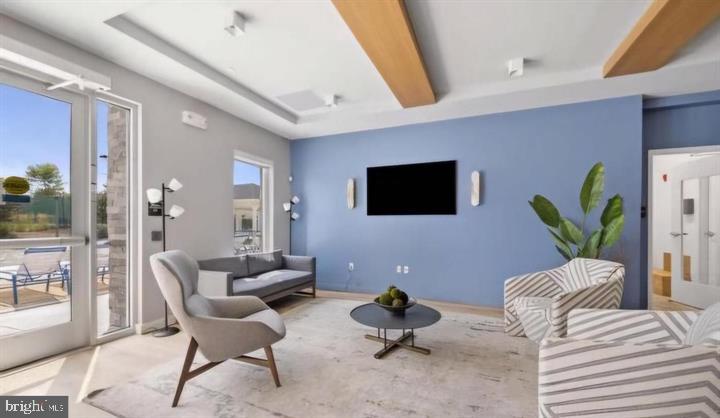9817 Solar Course Laurel, MD 20723 - Photo 47 of 59 a living room with furniture and a flat screen tv