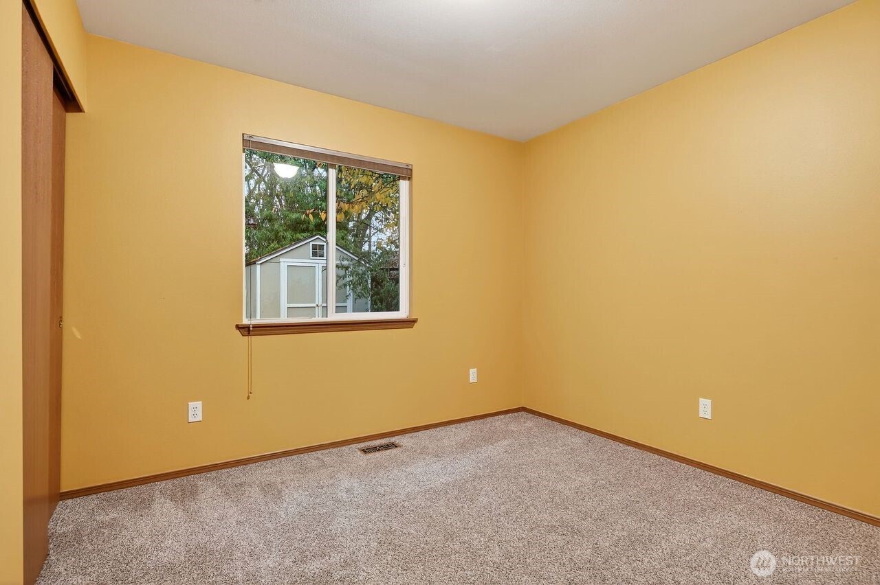 708 Marquette Avenue Snohomish, WA 98290 - Photo 24 of 33 a view of an empty room with a window