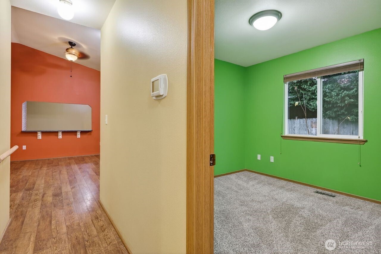 708 Marquette Avenue Snohomish, WA 98290 - Photo 29 of 33 a view of hallway with a door and wooden floor