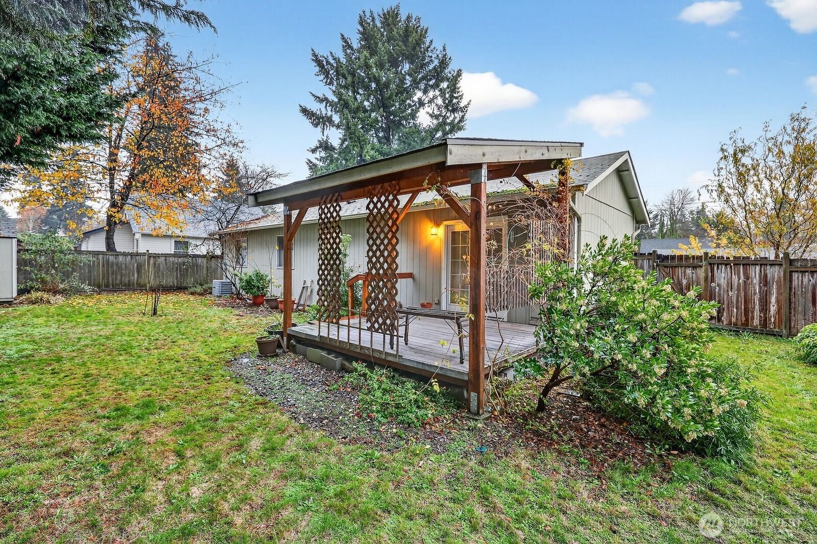 708 Marquette Avenue Snohomish, WA 98290 - Photo 30 of 33 a view of a house with backyard and sitting area
