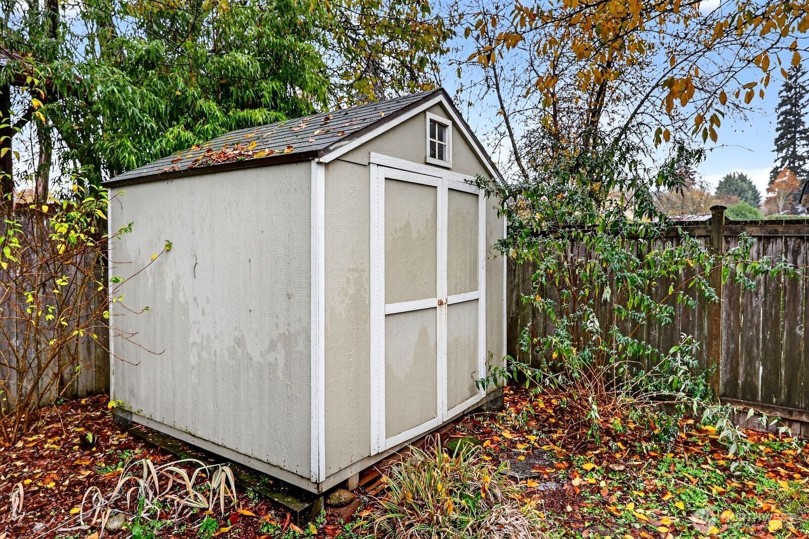 708 Marquette Avenue Snohomish, WA 98290 - Photo 33 of 33 a view of wooden house with a small yard