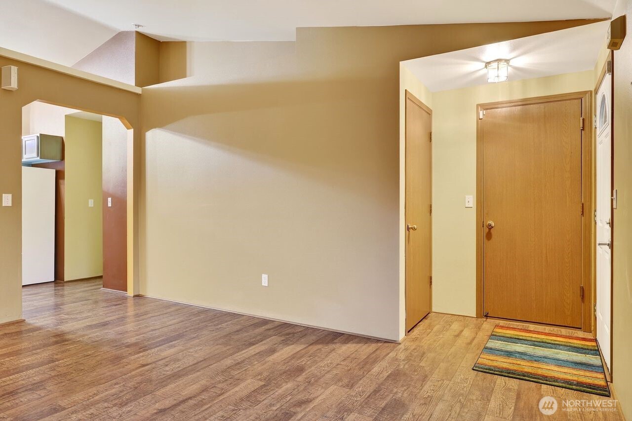 708 Marquette Avenue Snohomish, WA 98290 - Photo 4 of 33 a view of a room with wooden floor