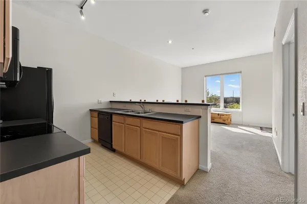 $265,000 | 15475 Andrews Drive, Unit 406, Denver, CO 80239