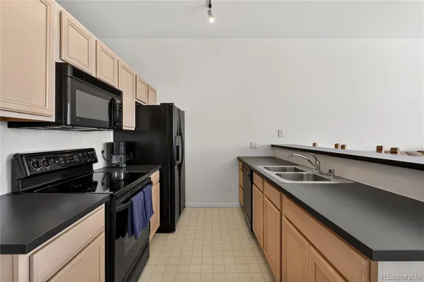 $265,000 | 15475 Andrews Drive, Unit 406, Denver, CO 80239