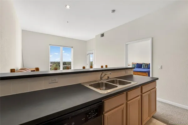 $265,000 | 15475 Andrews Drive, Unit 406, Denver, CO 80239