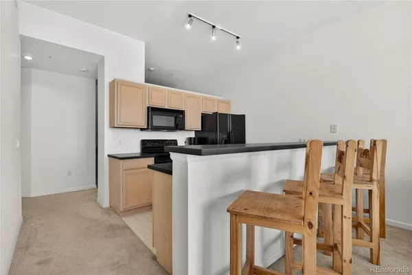 $265,000 | 15475 Andrews Drive, Unit 406, Denver, CO 80239