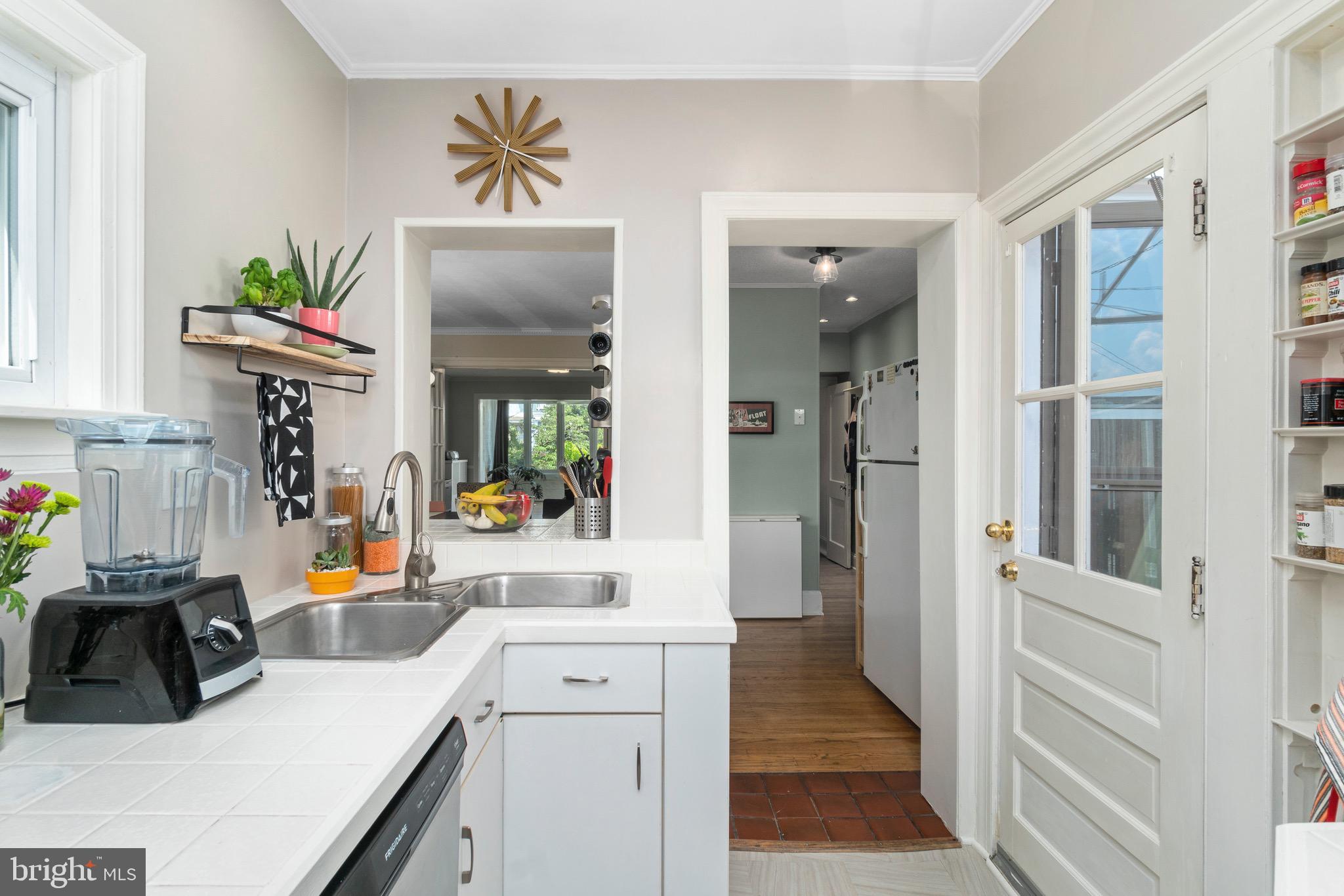 3615 Rexmere Road Baltimore, MD 21218 - Photo 18 of 34 Light-filled kitchen with deck access.