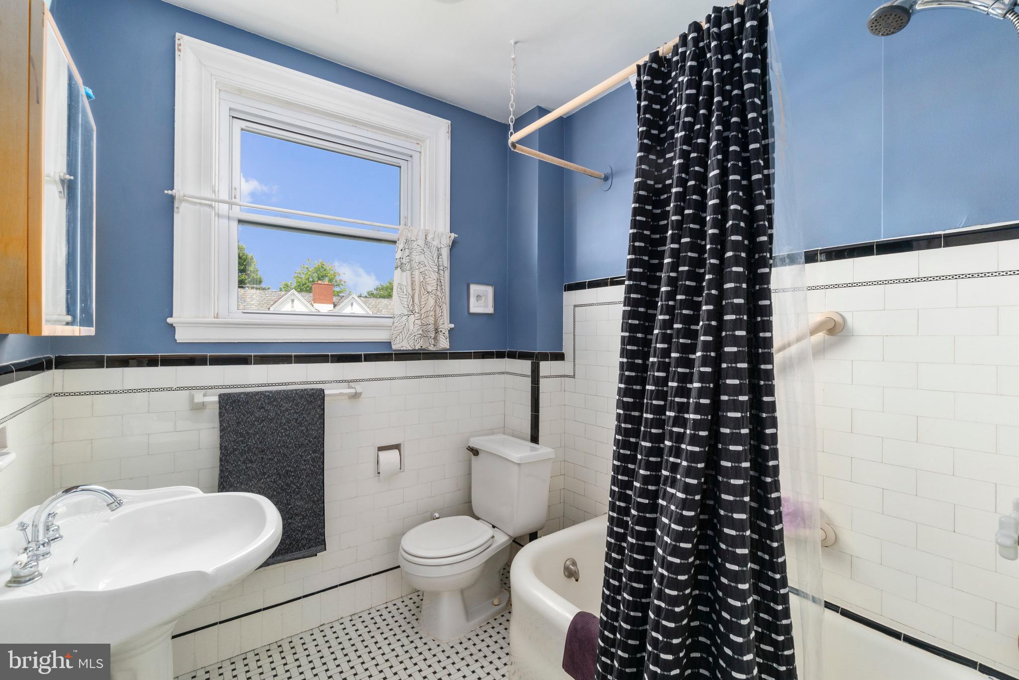 3615 Rexmere Road Baltimore, MD 21218 - Photo 29 of 34 Upper level bathroom with classic subway tile.