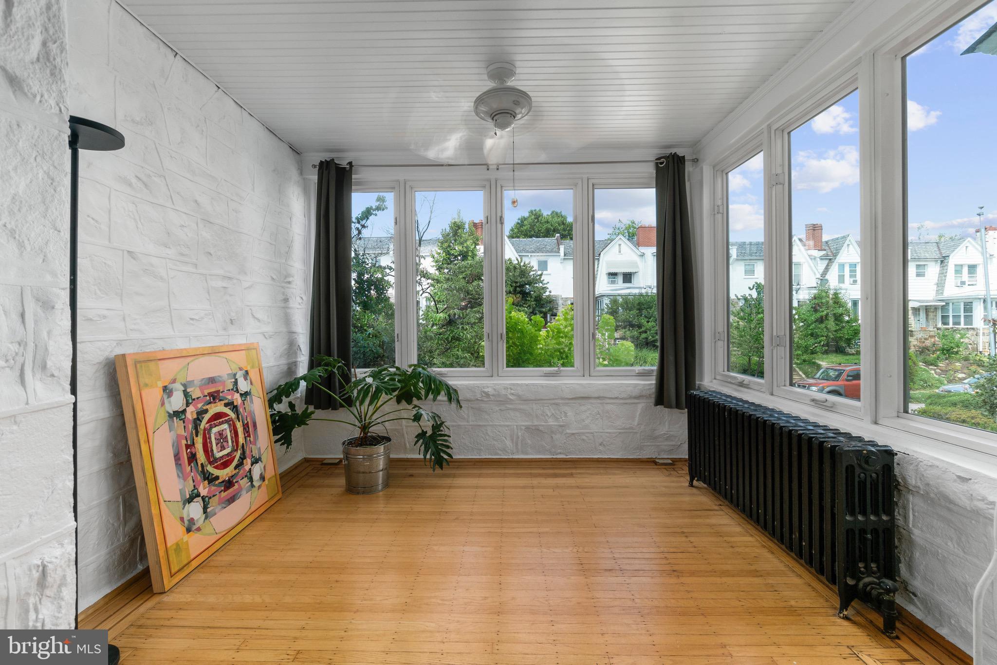 3615 Rexmere Road Baltimore, MD 21218 - Photo 8 of 34 Coveted west facing sunroom with replacement windo