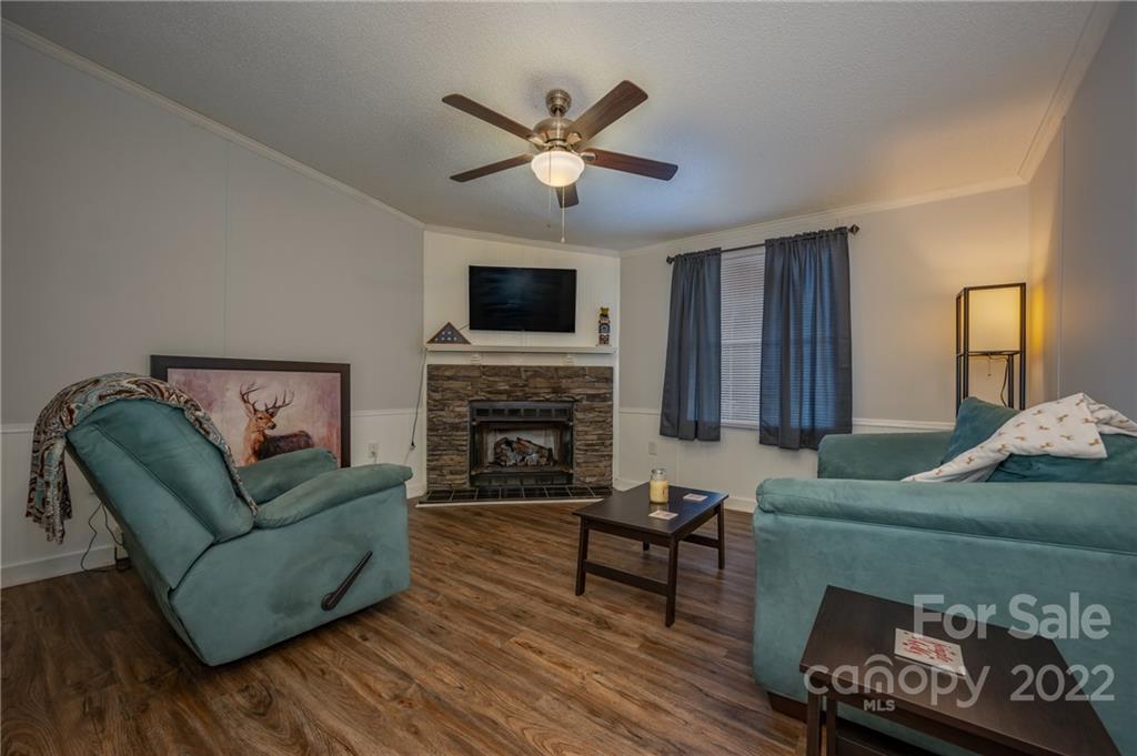 1139 Piney Knob Road Rutherfordton, NC 28139 - Photo 20 of 37 a living room with furniture and a fireplace