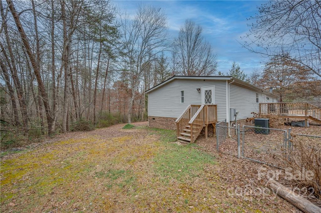 1139 Piney Knob Road Rutherfordton, NC 28139 - Photo 2 of 37 a view of backyard with a table and chairs