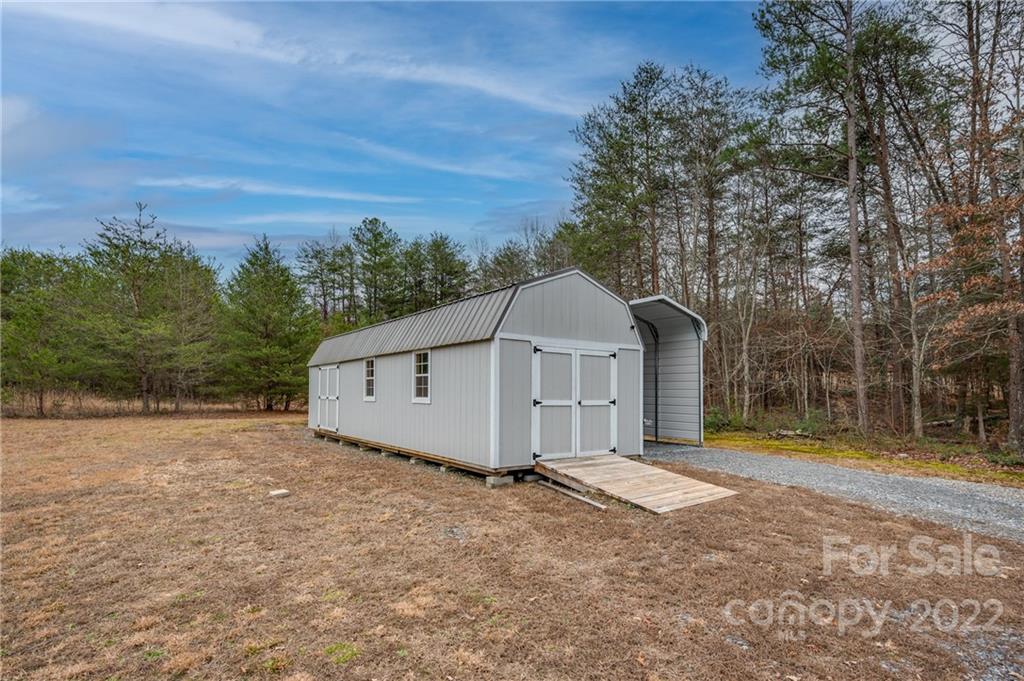 1139 Piney Knob Road Rutherfordton, NC 28139 - Photo 30 of 37 a view of a house with a yard