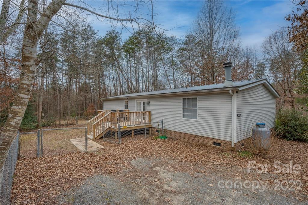 1139 Piney Knob Road Rutherfordton, NC 28139 - Photo 5 of 37 a backyard of a house with lots of green space
