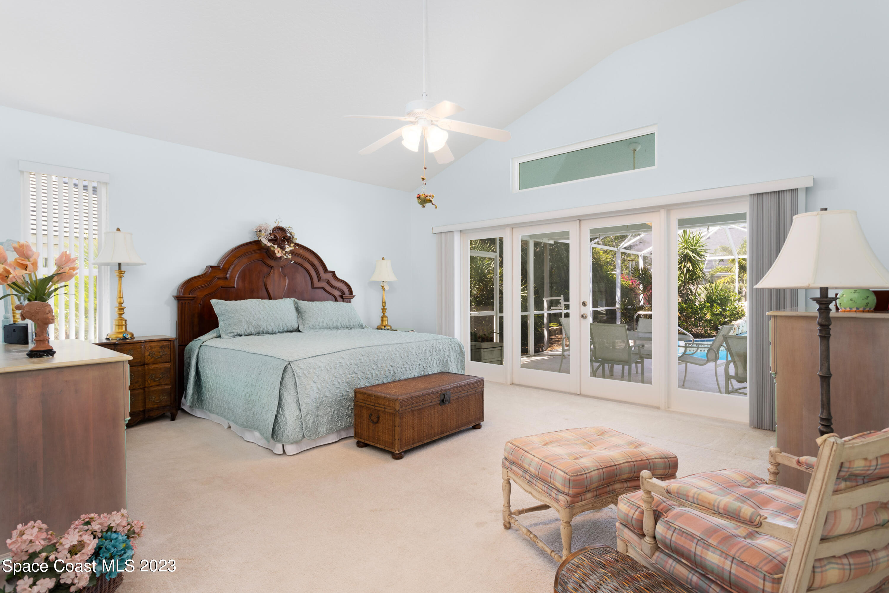 442 Sanderling Drive Indialantic, FL 32903 - Photo 21 of 45 a bedroom with a bed and a large window