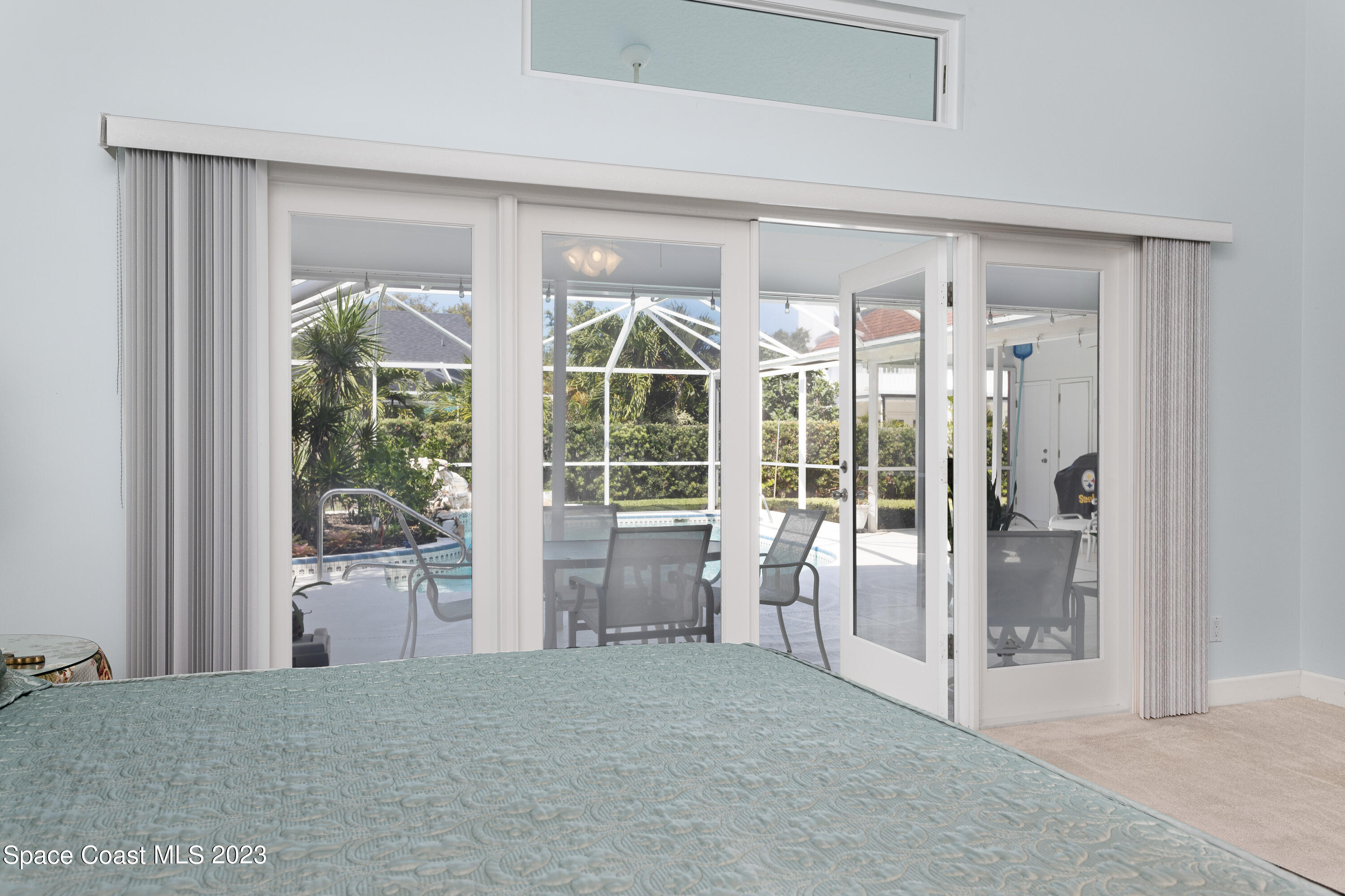 442 Sanderling Drive Indialantic, FL 32903 - Photo 23 of 45 a big room with yard and front door