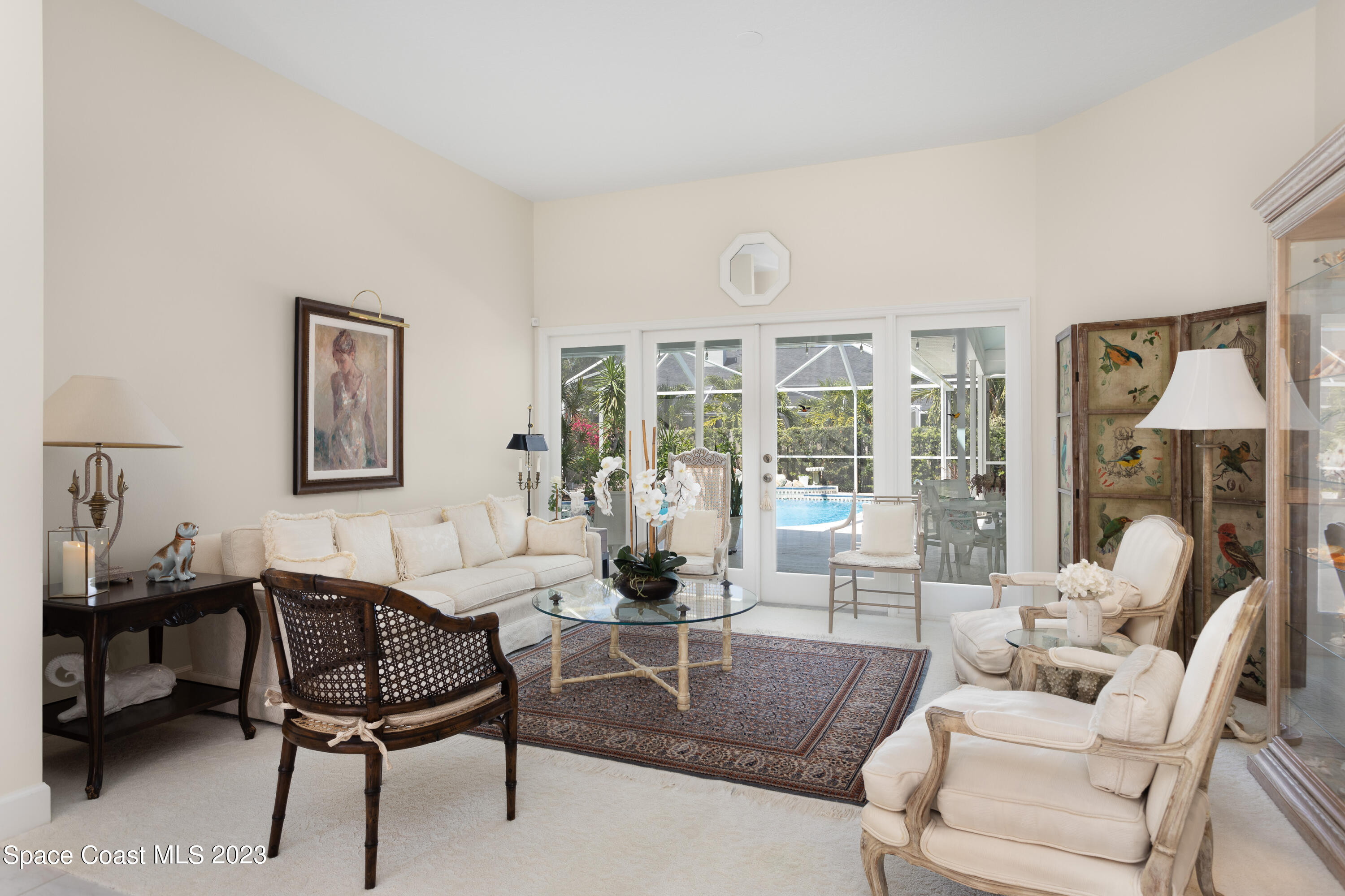 442 Sanderling Drive Indialantic, FL 32903 - Photo 10 of 45 a living room with furniture and a large window